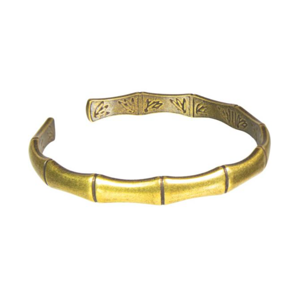 Brass and copper open cuff bracelet engraved with bamboo pattern—a Tibetan-inspired symbol of strength, resilience, and good fortune.