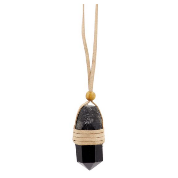 Set of three faceted black tourmaline point pendants wrapped in rustic leather, each on a black cord, symbolizing grounding and protection.