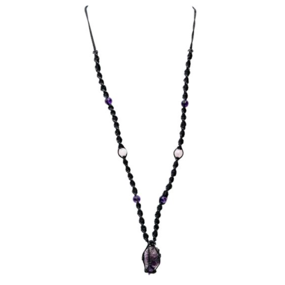 Amethyst Hippie Necklace with earthy beads, featuring a raw amethyst crystal point, symbolizing tranquility and spiritual growth.