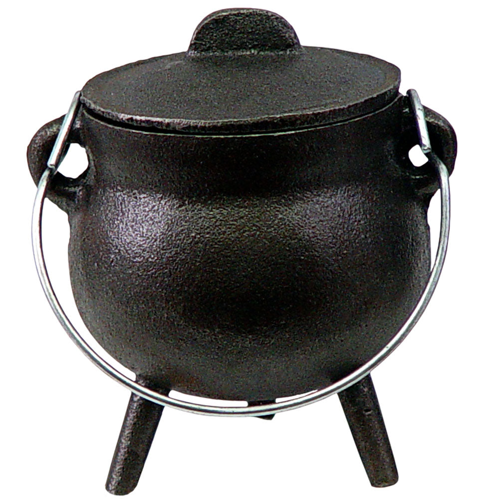 Mini cast iron cauldron with wire bail handle, three legs