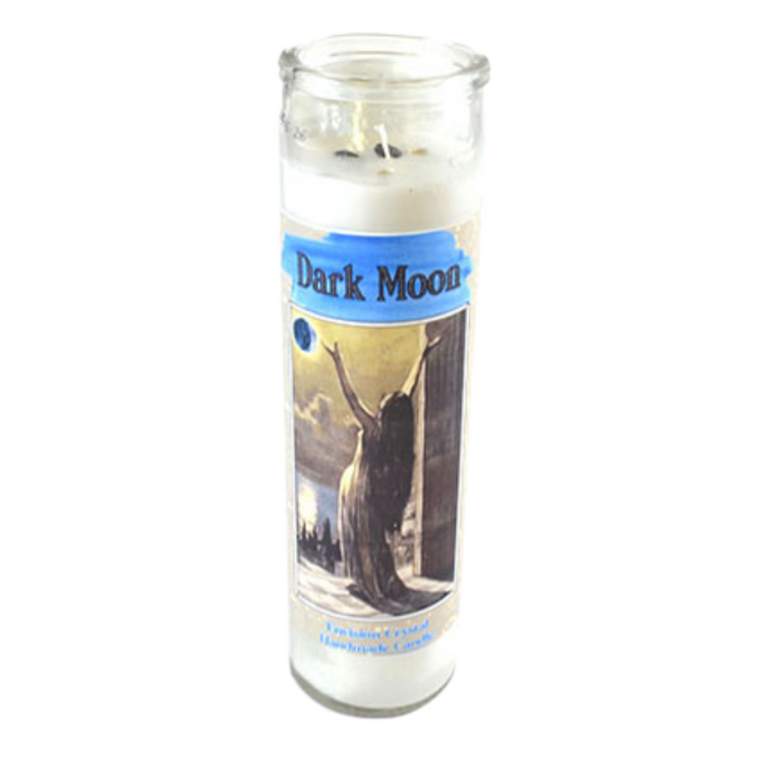 white 7-day Dark Moon ritual candle in a glass jar, styled on an altar with obsidian, smoke-cleansing herbs, and intention paper for release and shadow work.

