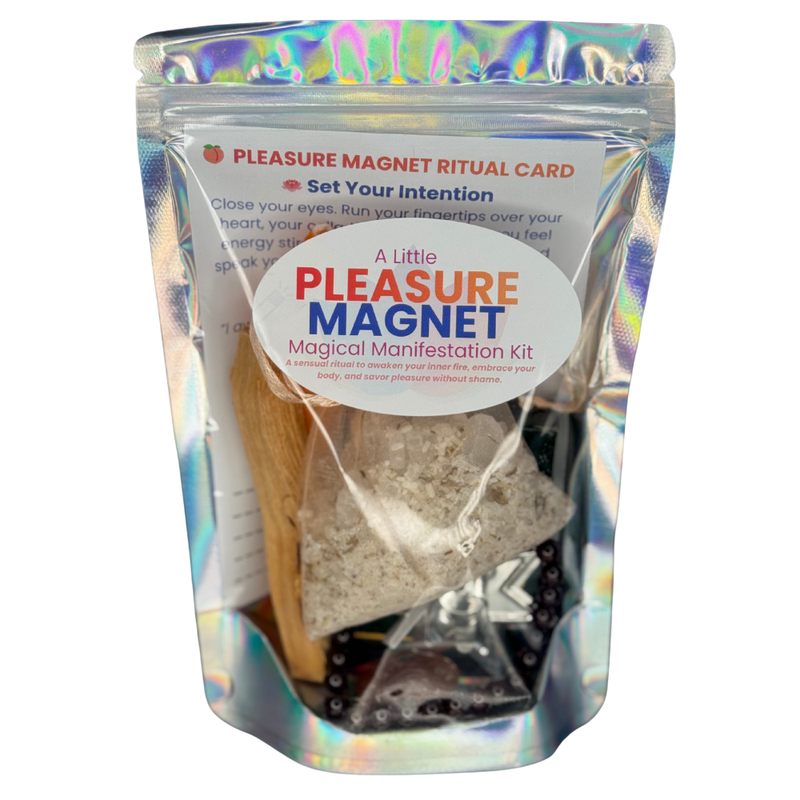 Pleasure Magnet Kit with orange candle, Palo Santo, Carnelian stone, and Garnet bracelet on a white background.