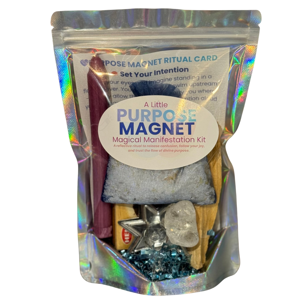 Purpose Magnet Magical Manifestation Kit with purple candle, Palo Santo, Clear Quartz, and Fluorite bracelet displayed on a white background.