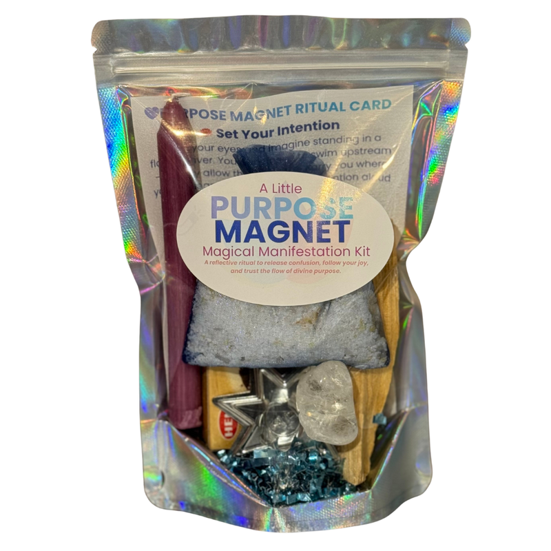 Purpose Magnet Magical Manifestation Kit with purple candle, Palo Santo, Clear Quartz, and Fluorite bracelet displayed on a white background.