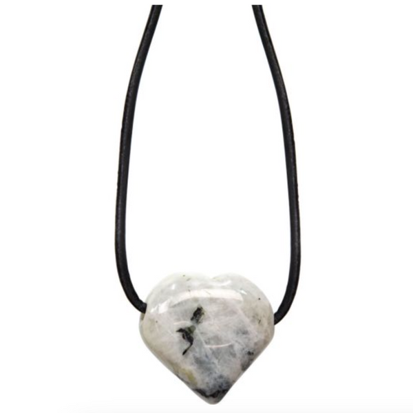 Heart-shaped rainbow moonstone necklace on black cord, glowing with soft white and iridescent flashes, symbolizing intuition and new beginnings.