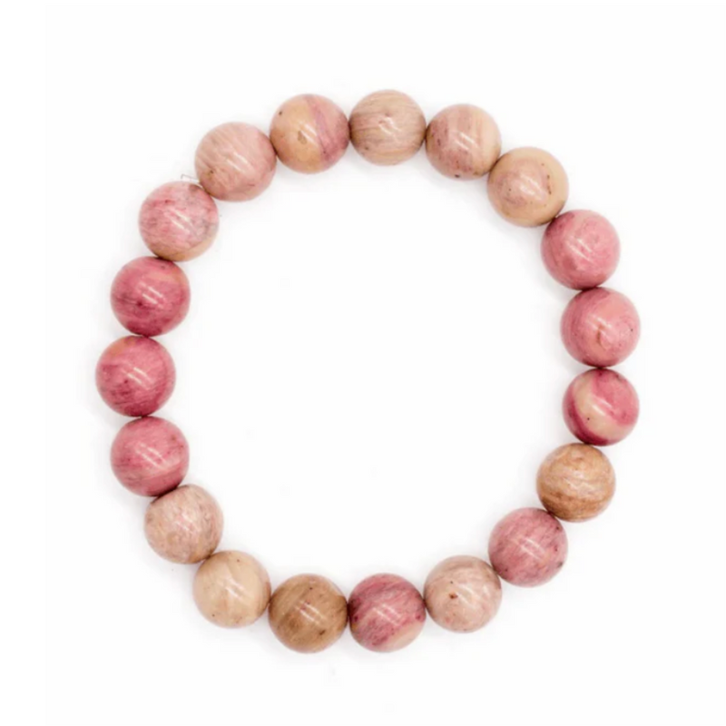 Open your heart and embrace deep healing with this Rhodochrosite 8mm Bead Bracelet. A powerful stone of compassion, self-love, and emotional release—perfect for heart-centered rituals and daily magic.