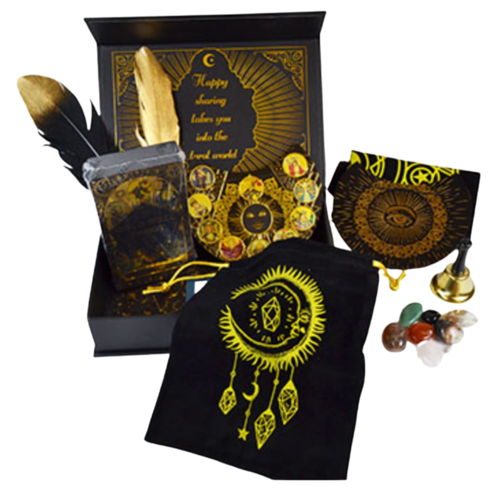 Decorative set with black and gold items including a feather, crystal pouch, and amulets on a white background.