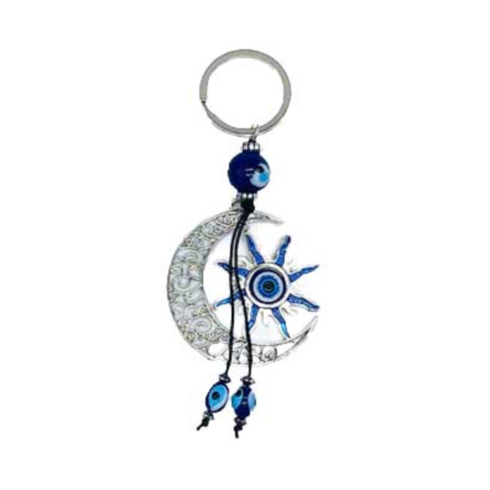A decorative keychain featuring a silver crescent moon and star design with blue and white evil eye details, a silver key ring, and dangling blue beads on a white background.