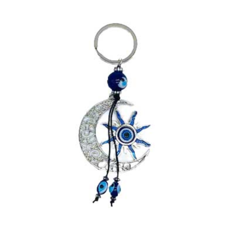 A decorative keychain featuring a silver crescent moon and star design with blue and white evil eye details, a silver key ring, and dangling blue beads on a white background.