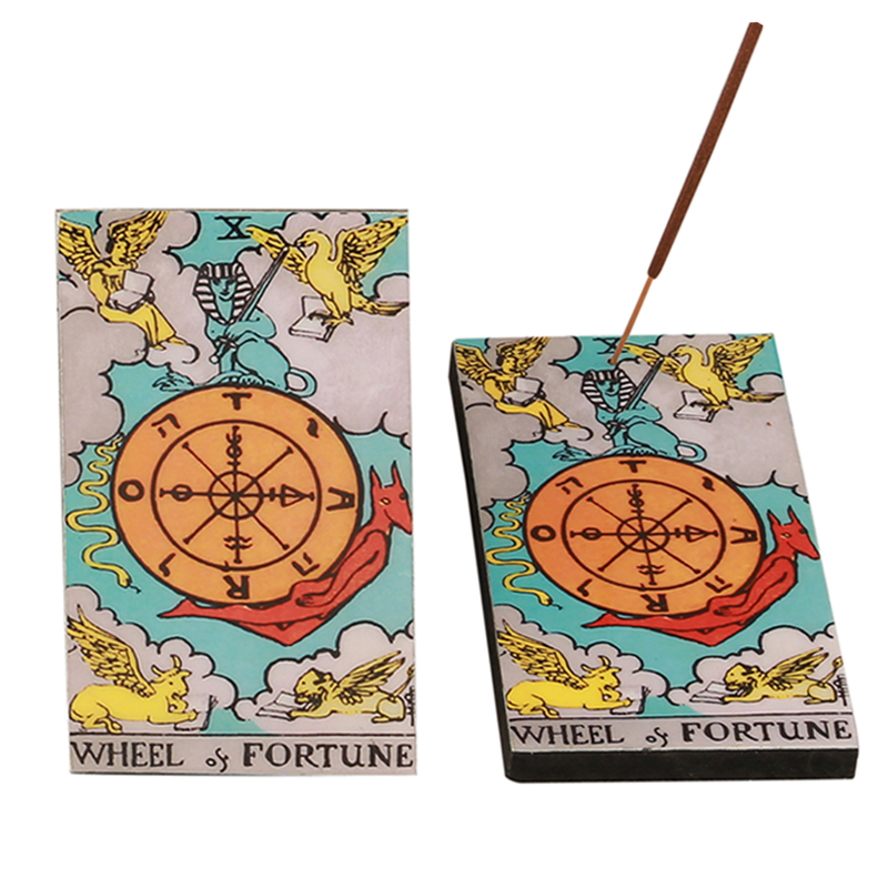 Wheel of Fortune tarot incense holder with stick inserted
