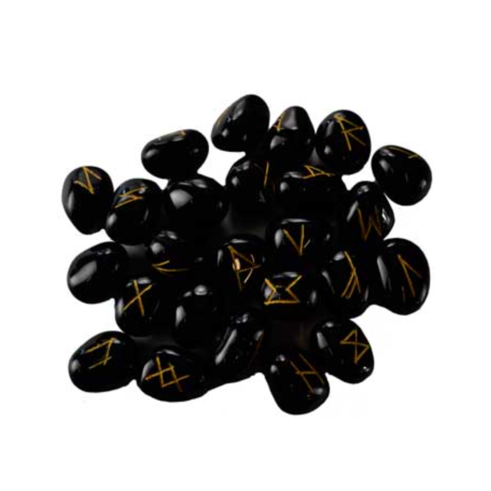 Black stones with gold runes on a white background