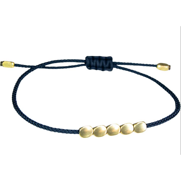 Adjustable Tibetan‑inspired copper bead wrap bracelet, elegant and earthy, designed for grounding, style, and intention.