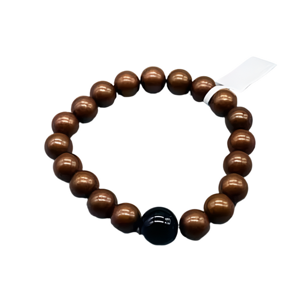 Copper and Lapis Lazuli 10mm beaded bracelet, featuring rich blue stones with metallic accents—symbolizing wisdom, truth, and energy flow.