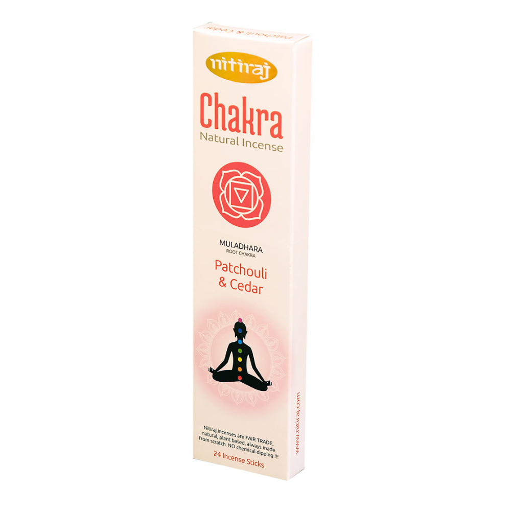 A box of Nitiraj Root Chakra Incense Sticks with a graphic of a person meditating and the chakra system.