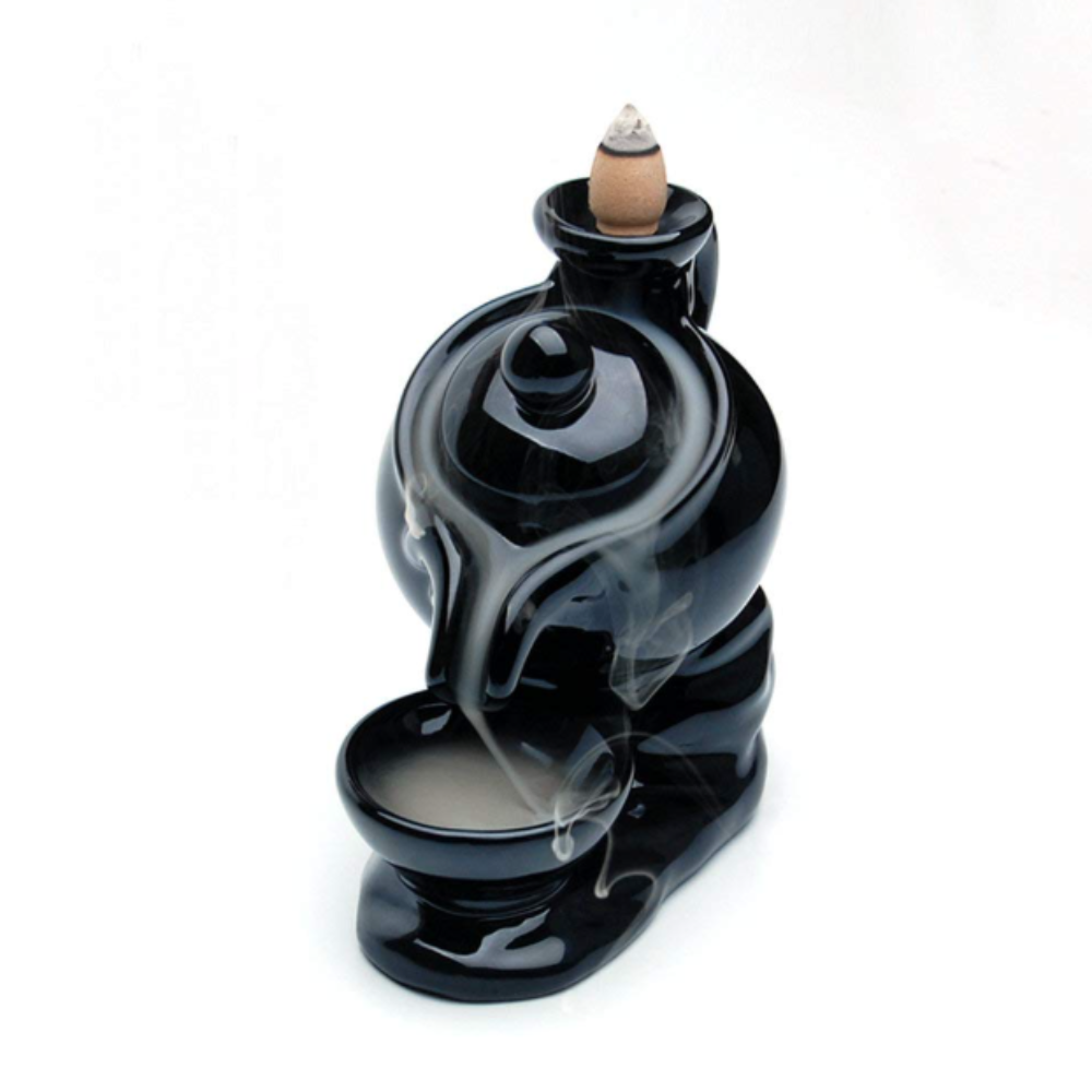 Ceramic Water Teapot Backflow Incense Burner in teapot-and-cup design, producing a calming smoke waterfall—ideal for ceremony, ritual, and mindful ambiance.