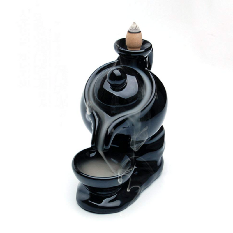 Ceramic Water Teapot Backflow Incense Burner in teapot-and-cup design, producing a calming smoke waterfall—ideal for ceremony, ritual, and mindful ambiance.
