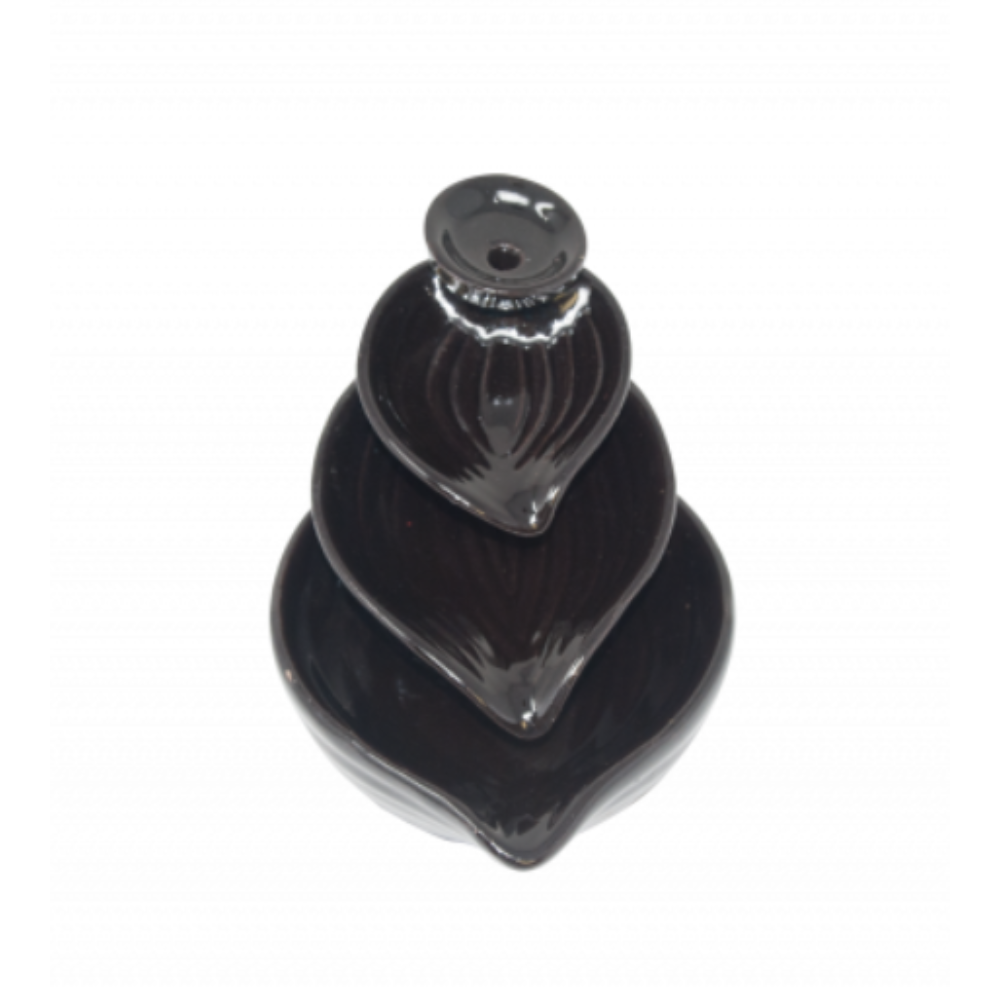 Ceramic leaf-shaped backflow incense burner showcasing tiered design and waterfall smoke effect—used for meditation, ritual, and mindful ambiance.
